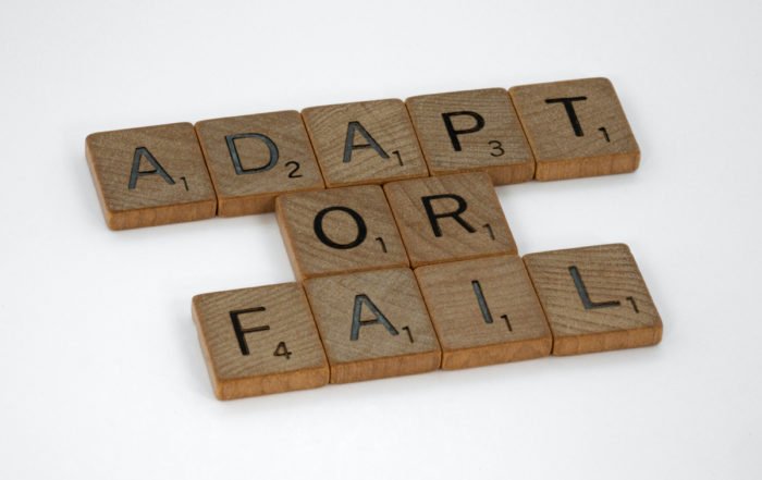 adapt or fail phrase using scrabble letters